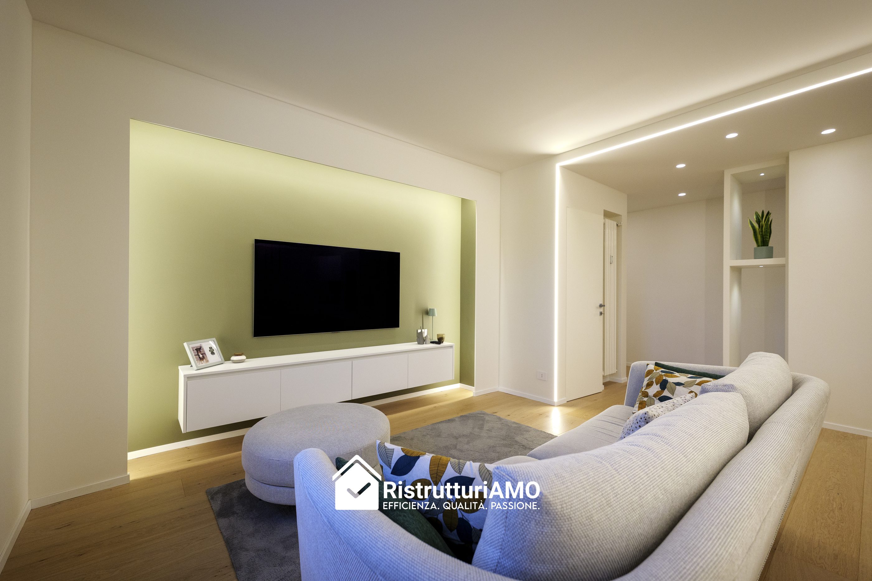 Living room renovated by Ristrutturiamo Italia, with a backlit green feature wall and LED ceiling lines
